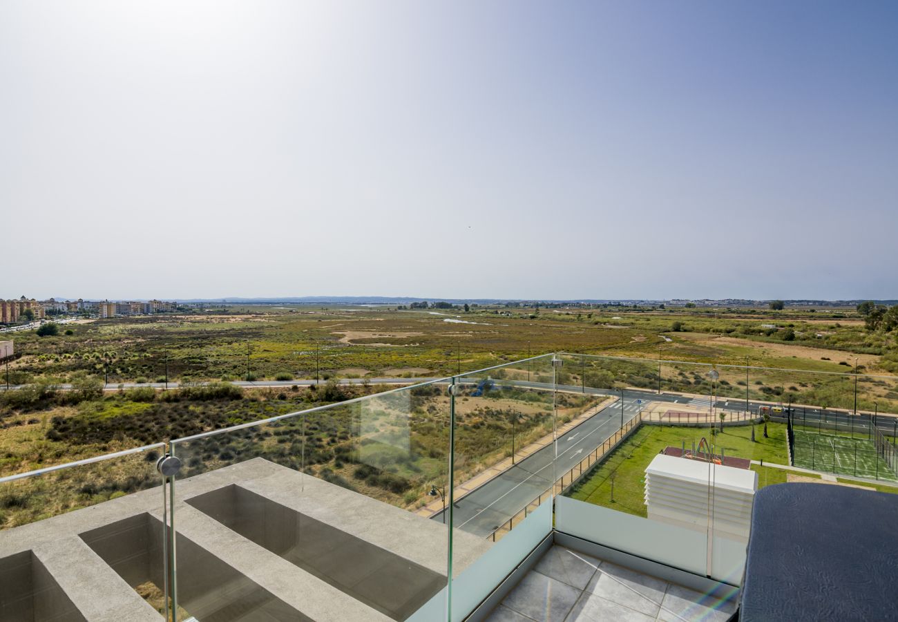 Lägenhet i Isla Canela - Los Flamencos Penthouse by Ĥ - Haraganes Beach HLHF4501P43